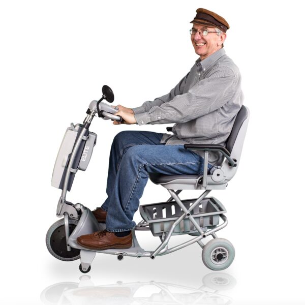 Man sat on the Elite mobility scooter in blue by tzora mobility scooters